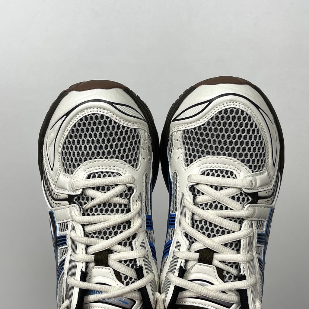 Shop ASICS GEL-KAYANO 14 1203A740-104 in Cream and Blue Coast with GEL cushioning, TRUSSTIC support and original-inspired 2008 tooling.