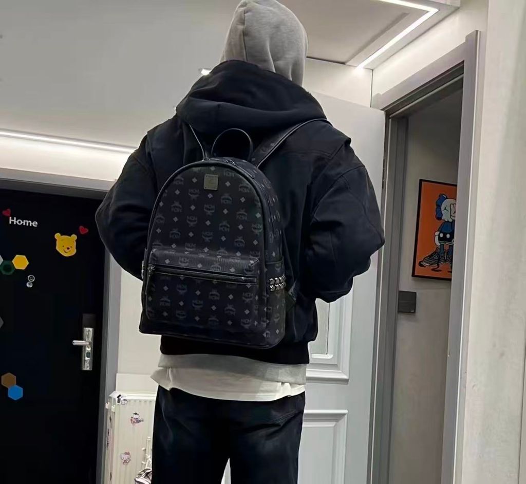 MCM Stark Side Studs Backpack MMK6SVE38BK001 Black Visetos medium MCM MMK6SVE38BK001 Black Visetos monogram Nappa leather studded backpack MCM Stark Medium Black backpack dark silver studs 13 inch laptop sleeve