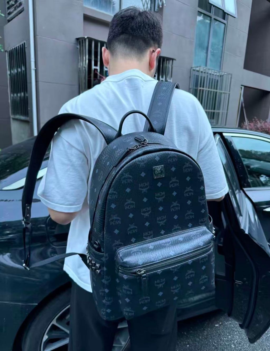 MCM Stark Side Studs Backpack MMK6SVE38BK001 Black Visetos medium MCM MMK6SVE38BK001 Black Visetos monogram Nappa leather studded backpack MCM Stark Medium Black backpack dark silver studs 13 inch laptop sleeve