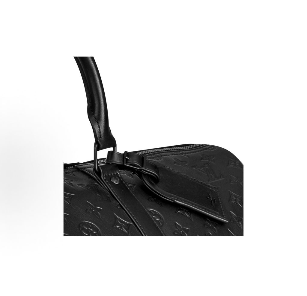 Louis Vuitton Keepall Bandoulière 50 M44810 Black Monogram Shadow leather travel bag Louis Vuitton M44810 Keepall 50 Black embossed Monogram leather weekender bag Louis Vuitton Keepall Bandoulière 50 Black M44810 matte hardware shoulder travel bag