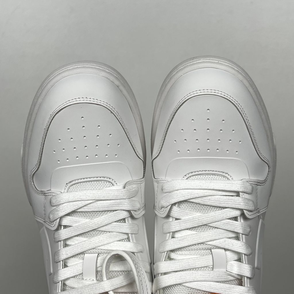 Shop Off-White Out Of Office Molded OMIA189S26MAT0010120 in White and Orange with molded TPU upper, signature Arrow motif and rubber outsole.