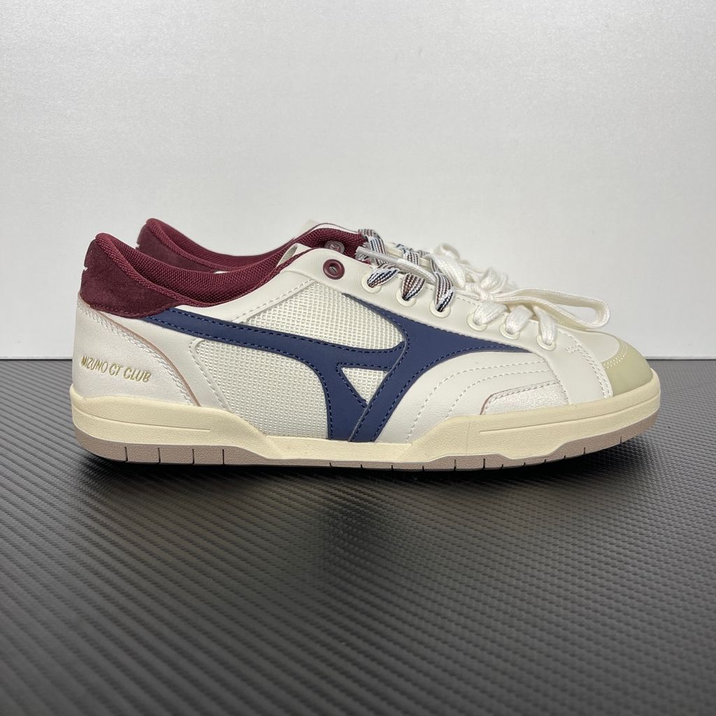 Shop Mizuno CT CLUB D1GH261010 in Light Beige, Navy and Burgundy with mixed textile and leather-based upper, retro court styling and low-top construction.