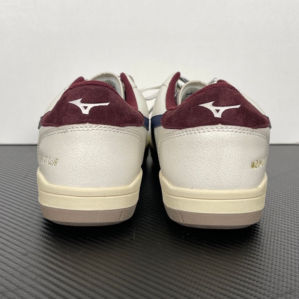 Shop Mizuno CT CLUB D1GH261010 in Light Beige, Navy and Burgundy with mixed textile and leather-based upper, retro court styling and low-top construction.