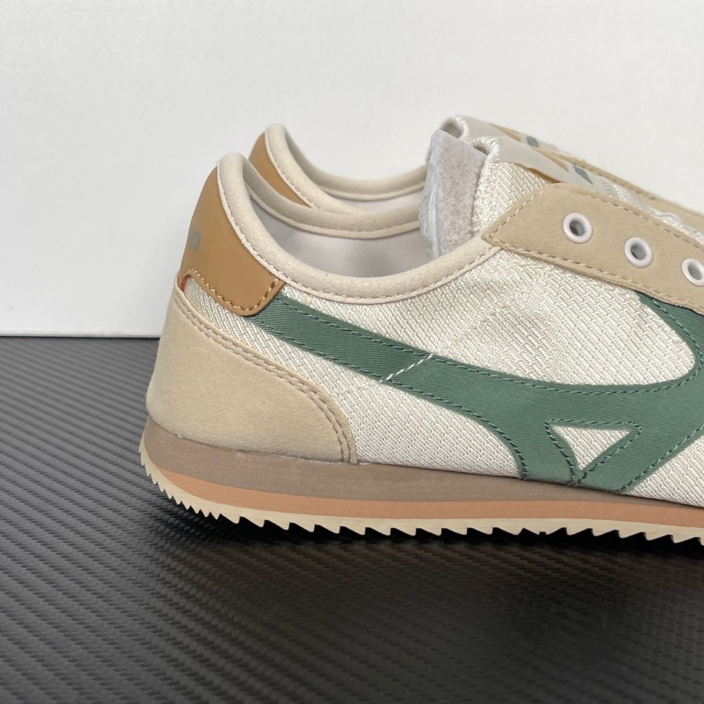 Shop Mizuno LG 60S Slip-On D1GH240212 in Off-White, Army Green and Grey with lace-free construction, retro low-profile styling and RunBird branding.