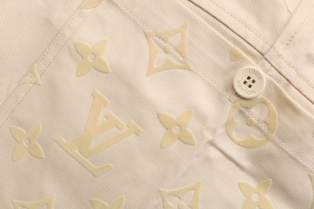 Louis Vuitton Monogram flocked patchwork trousers woven twill pants polyester flocking contrast cotton lining engraved stud designer pants sizes 46-52