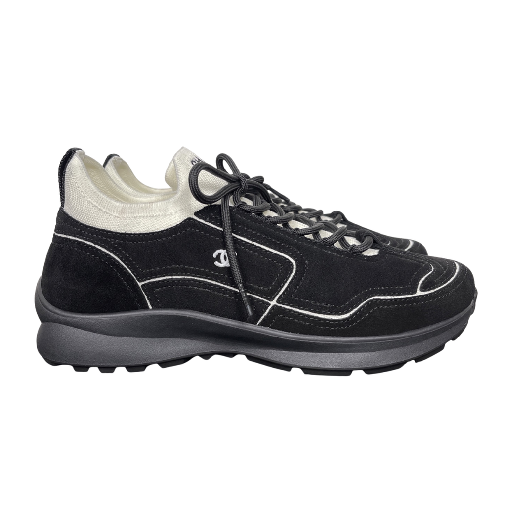 Shop Chanel 26A Sneakers G47416 B25250 UB774 in Black calfskin and suede calfskin with contrast piping, CC logo and substantial lifestyle sole.