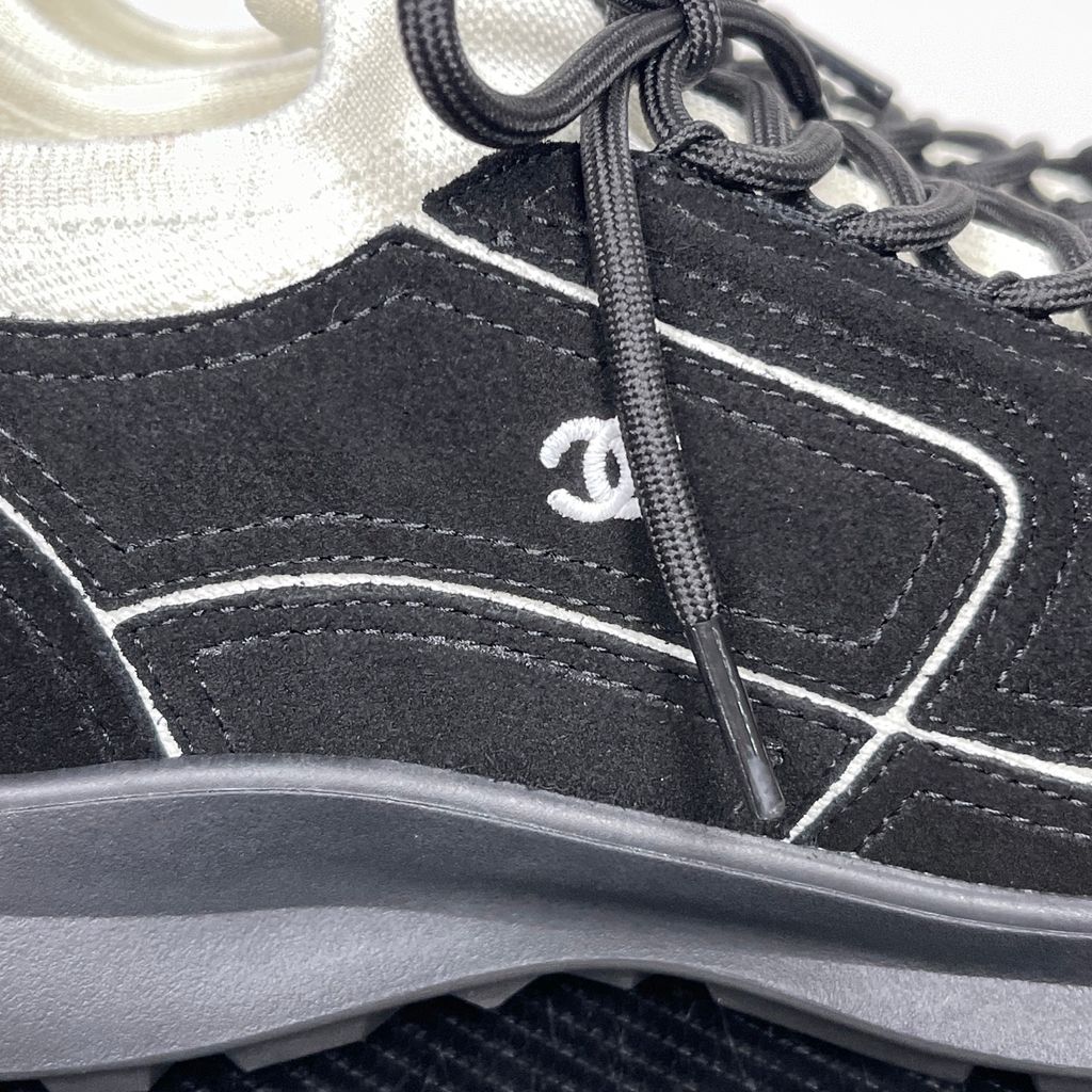 Shop Chanel 26A Sneakers G47416 B25250 UB774 in Black calfskin and suede calfskin with contrast piping, CC logo and substantial lifestyle sole.