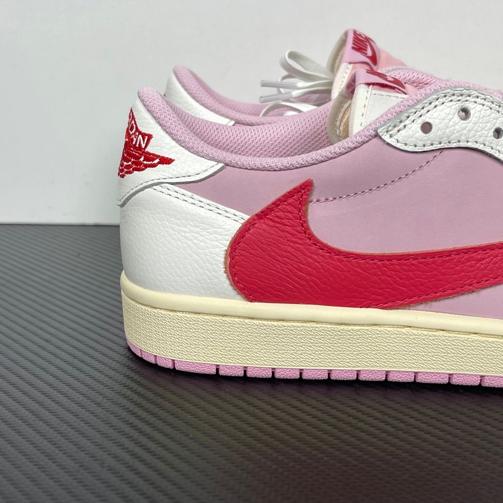 Shop Travis Scott x Air Jordan 1 Low OG SP IQ7604-101 Tropical Pink with premium leather, pink nubuck underlays, reverse Swoosh and co-branded details.
