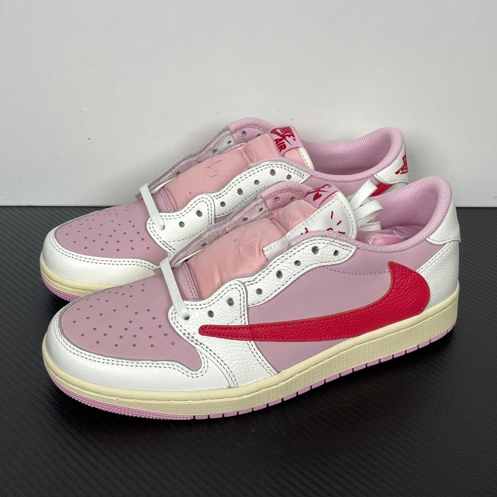 Shop Travis Scott x Air Jordan 1 Low OG SP IQ7604-101 Tropical Pink with premium leather, pink nubuck underlays, reverse Swoosh and co-branded details.