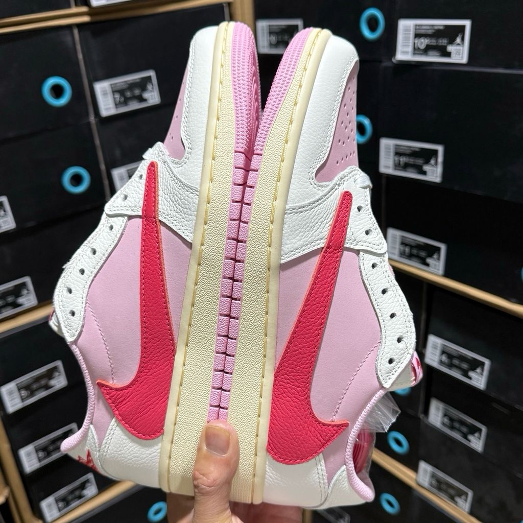 Shop Travis Scott x Air Jordan 1 Low OG SP IQ7604-101 Tropical Pink with premium leather, pink nubuck underlays, reverse Swoosh and co-branded details.