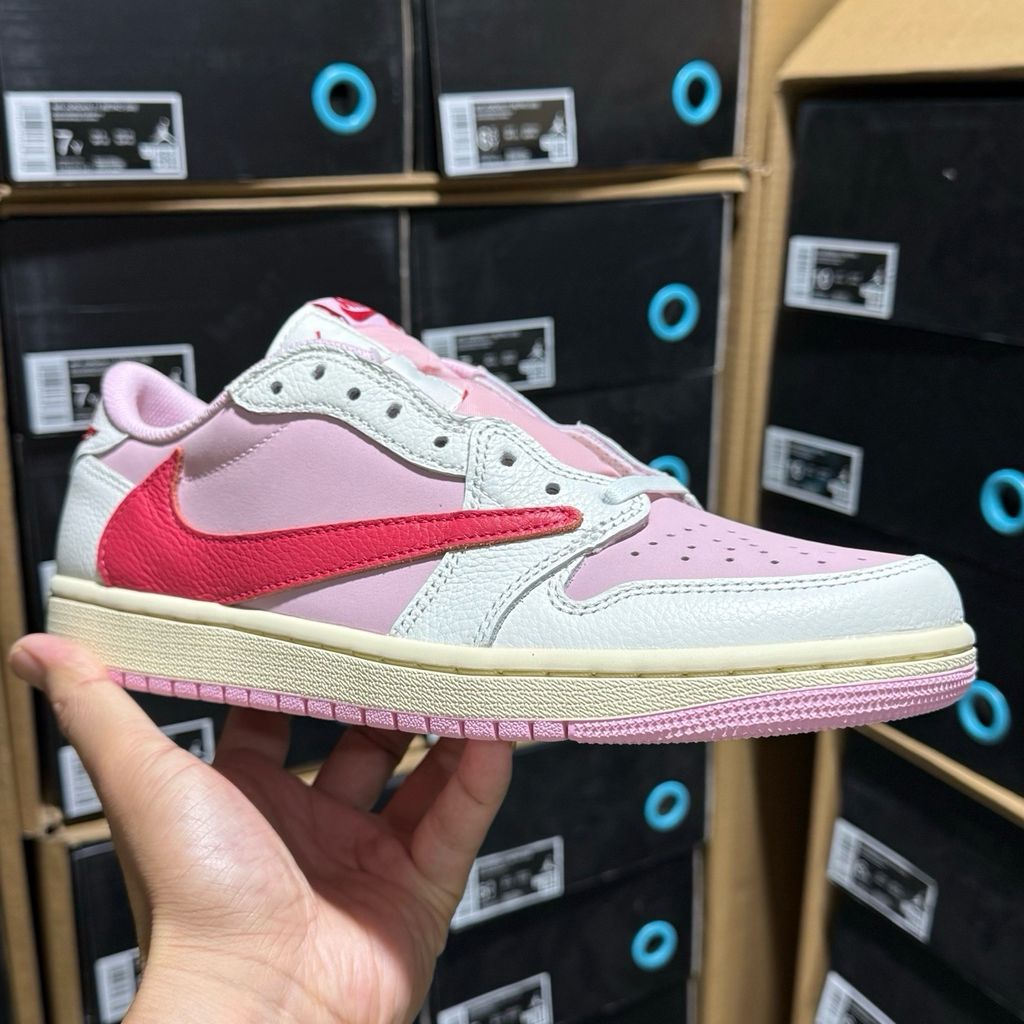 Shop Travis Scott x Air Jordan 1 Low OG SP IQ7604-101 Tropical Pink with premium leather, pink nubuck underlays, reverse Swoosh and co-branded details.