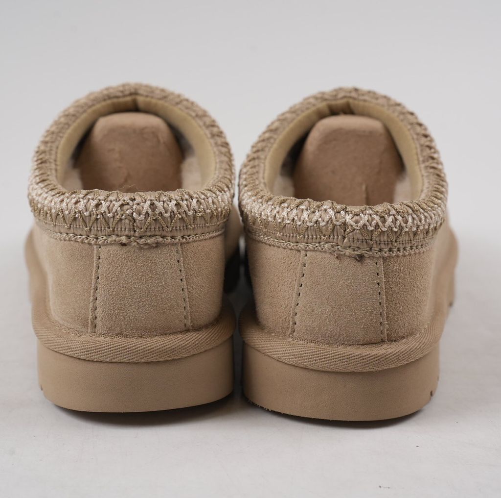 Shop UGG Women's Tasman II 1174470-MUSR in Mushroom suede with 17mm sheepskin lining, UGGbraid collar and lightweight Sugarcane EVA outsole.