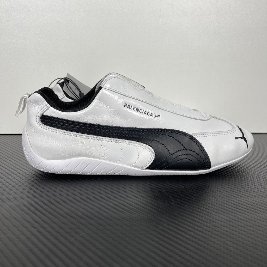 Balenciaga x PUMA Speedcat Leather 847148-WSDSB-9010 White Black Men's Slip-On Sneakers with White Cowskin Leather Upper, Black PUMA Formstrip, Debossed Balenciaga and PUMA Logos, Embroidered PUMA Cat Toe, Reflective Rear Pull Tab and Rubber Outsole