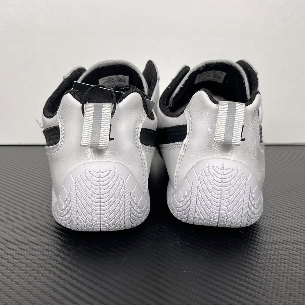 Balenciaga x PUMA Speedcat Leather 847148-WSDSB-9010 White Black Men's Slip-On Sneakers with White Cowskin Leather Upper, Black PUMA Formstrip, Debossed Balenciaga and PUMA Logos, Embroidered PUMA Cat Toe, Reflective Rear Pull Tab and Rubber Outsole