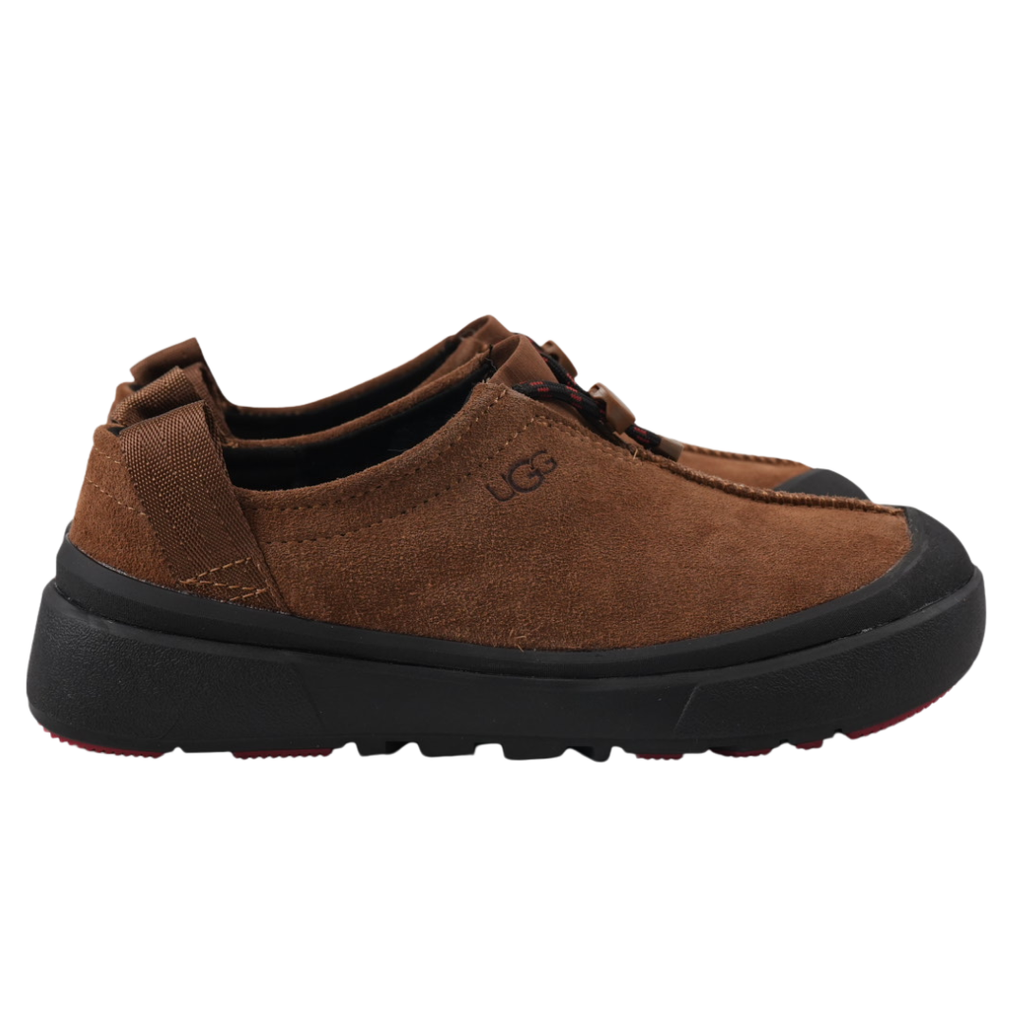 Verified against UGG's current 1179050-DKC Dark Chestnut Tasman Outpost product information, including waterproof suede, seam-sealed construction, 17mm UGGpure/UGGplush interior, Sugarcane EVA and White Spider Rubber outsole. UGG