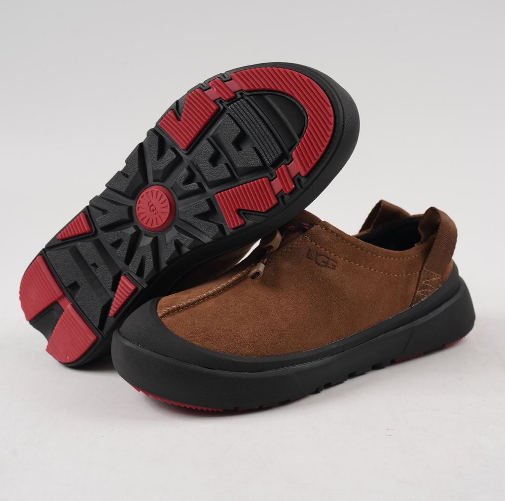Verified against UGG's current 1179050-DKC Dark Chestnut Tasman Outpost product information, including waterproof suede, seam-sealed construction, 17mm UGGpure/UGGplush interior, Sugarcane EVA and White Spider Rubber outsole. UGG