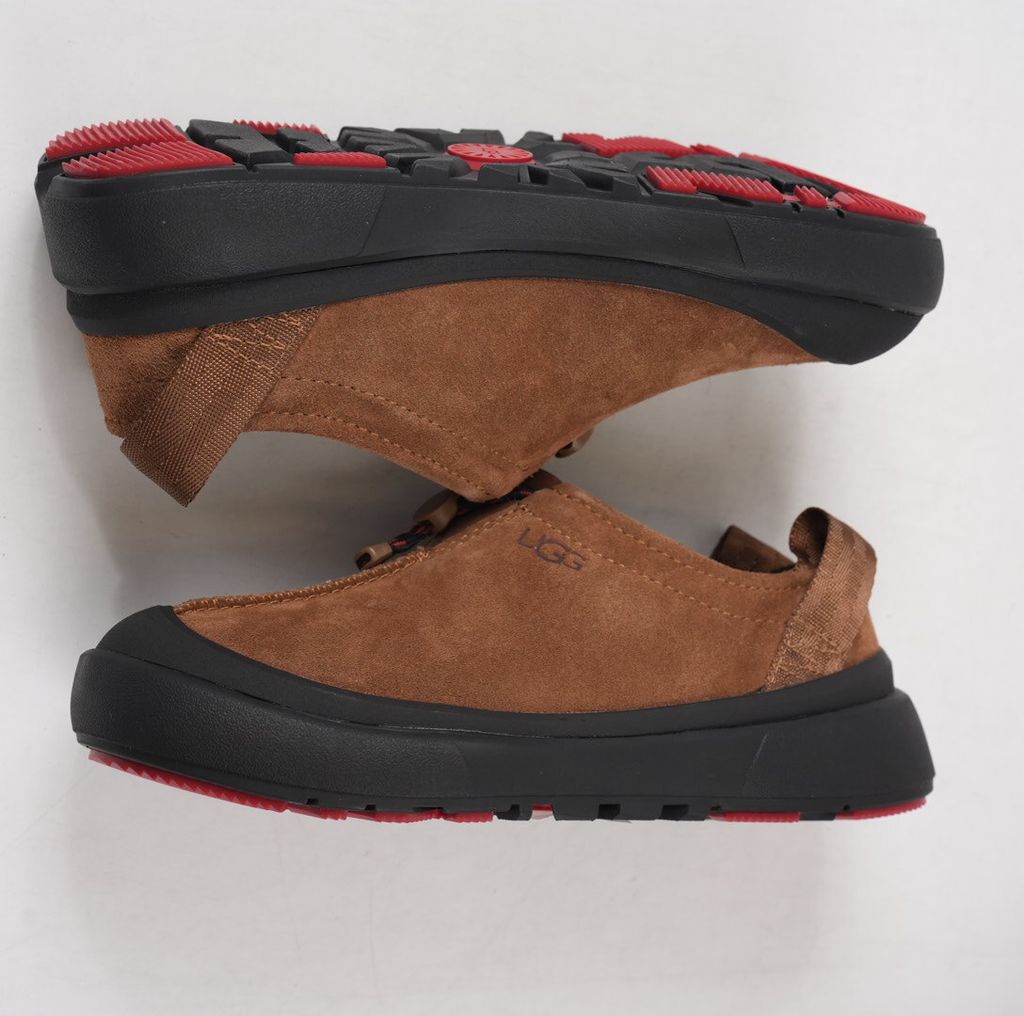 Verified against UGG's current 1179050-DKC Dark Chestnut Tasman Outpost product information, including waterproof suede, seam-sealed construction, 17mm UGGpure/UGGplush interior, Sugarcane EVA and White Spider Rubber outsole. UGG