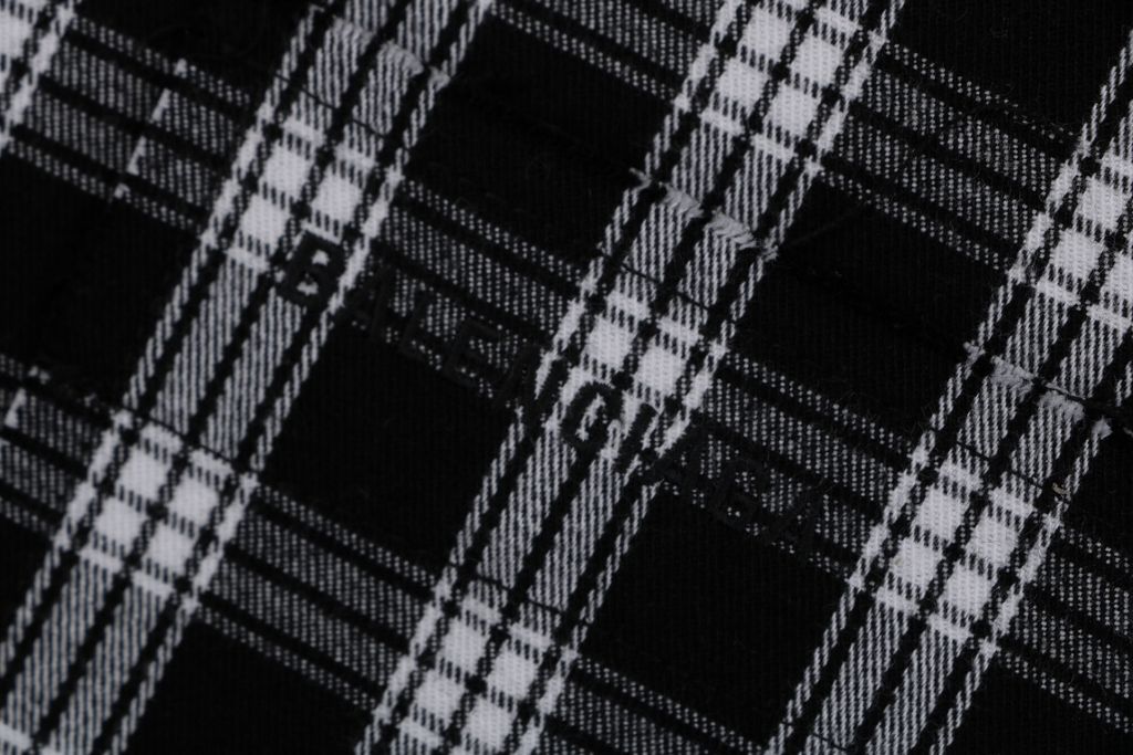 Balenciaga black white plaid distressed raw hem long sleeve shirt yarn dyed check pattern matched chest pocket matte metal snap button streetwear overshirt sizes 1 XS to 4 L