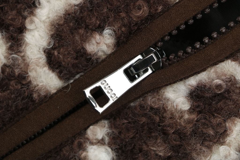 Gucci Double G monogram sherpa fleece jacket brown all over diamond GG jacquard plush high neck zip hidden pockets relaxed unisex outerwear sizes 48 50 52 54 56