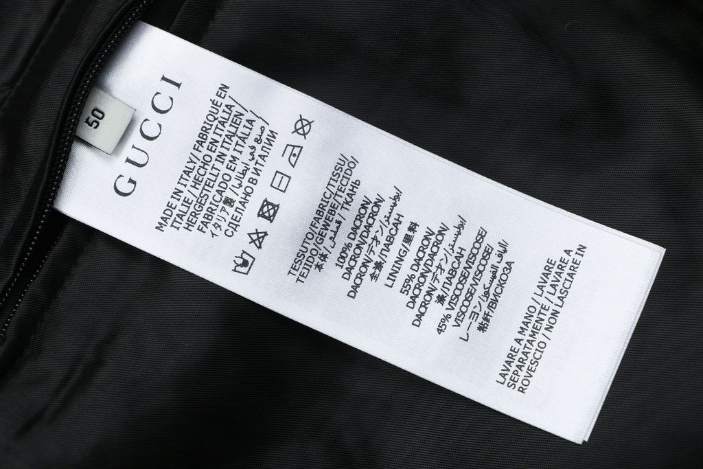 Gucci Double G monogram sherpa fleece jacket brown all over diamond GG jacquard plush high neck zip hidden pockets relaxed unisex outerwear sizes 48 50 52 54 56