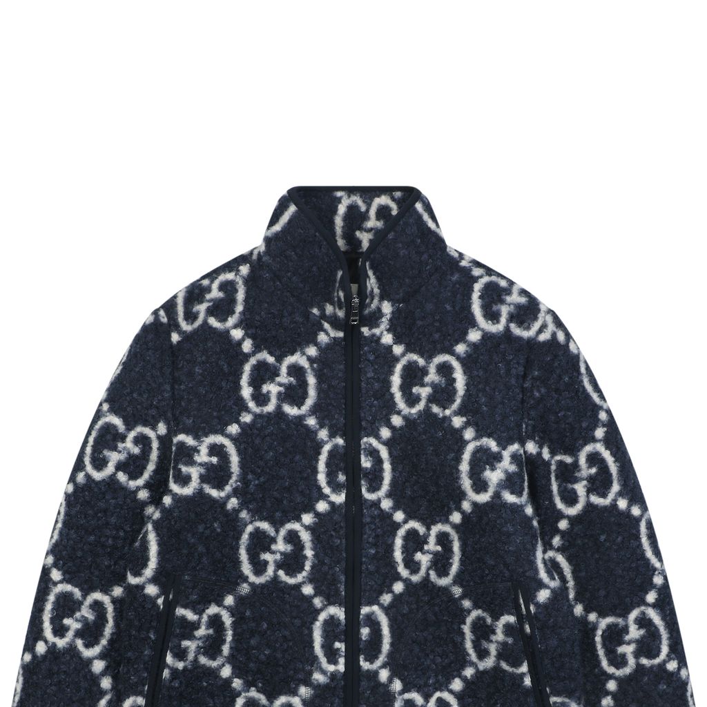 Gucci Double G monogram sherpa fleece jacket blue navy all over diamond GG jacquard plush high neck zip hidden pockets relaxed unisex outerwear sizes 48 50 52 54 56