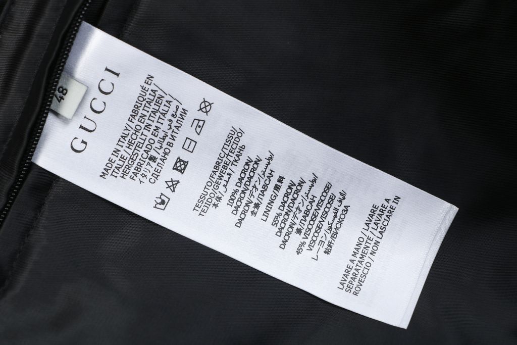 Gucci Double G monogram sherpa fleece jacket blue navy all over diamond GG jacquard plush high neck zip hidden pockets relaxed unisex outerwear sizes 48 50 52 54 56