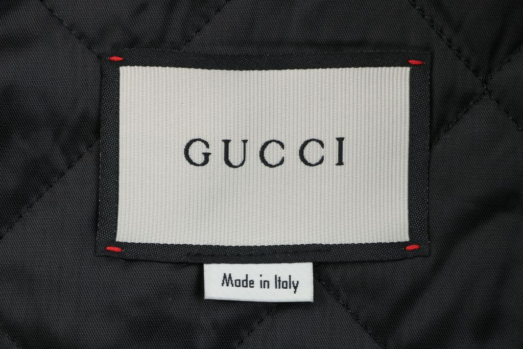 Gucci Double G monogram sherpa fleece jacket blue navy all over diamond GG jacquard plush high neck zip hidden pockets relaxed unisex outerwear sizes 48 50 52 54 56