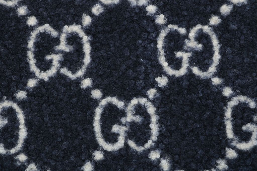 Gucci Double G monogram sherpa fleece jacket blue navy all over diamond GG jacquard plush high neck zip hidden pockets relaxed unisex outerwear sizes 48 50 52 54 56
