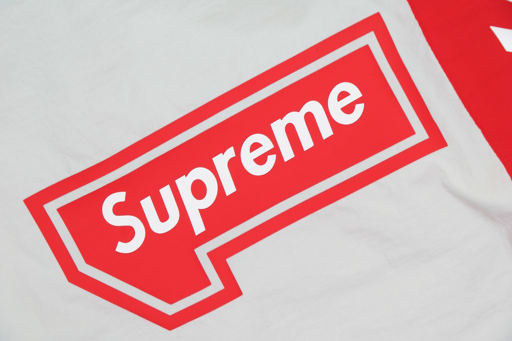 Supreme Ducati racing stand collar track jacket matte technical fabric breathable mesh lining 3D silicone logo metal plaque YKK zipper unisex sizes S-XL
