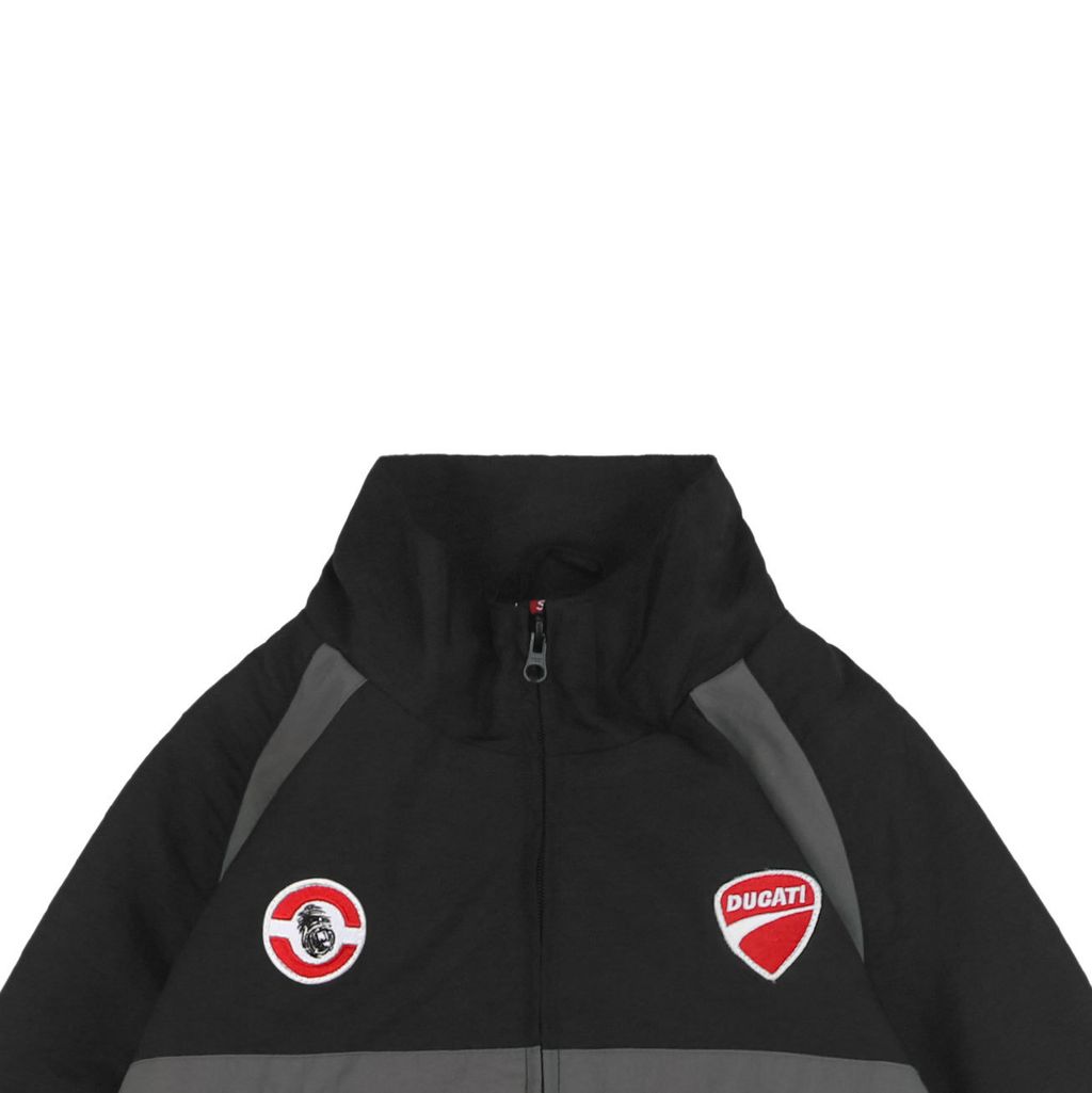 Supreme Ducati racing stand collar track jacket black matte technical fabric breathable mesh lining 3D silicone logo metal plaque YKK zipper unisex sizes S-XL
