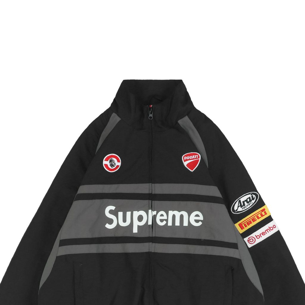 Supreme Ducati racing stand collar track jacket black matte technical fabric breathable mesh lining 3D silicone logo metal plaque YKK zipper unisex sizes S-XL