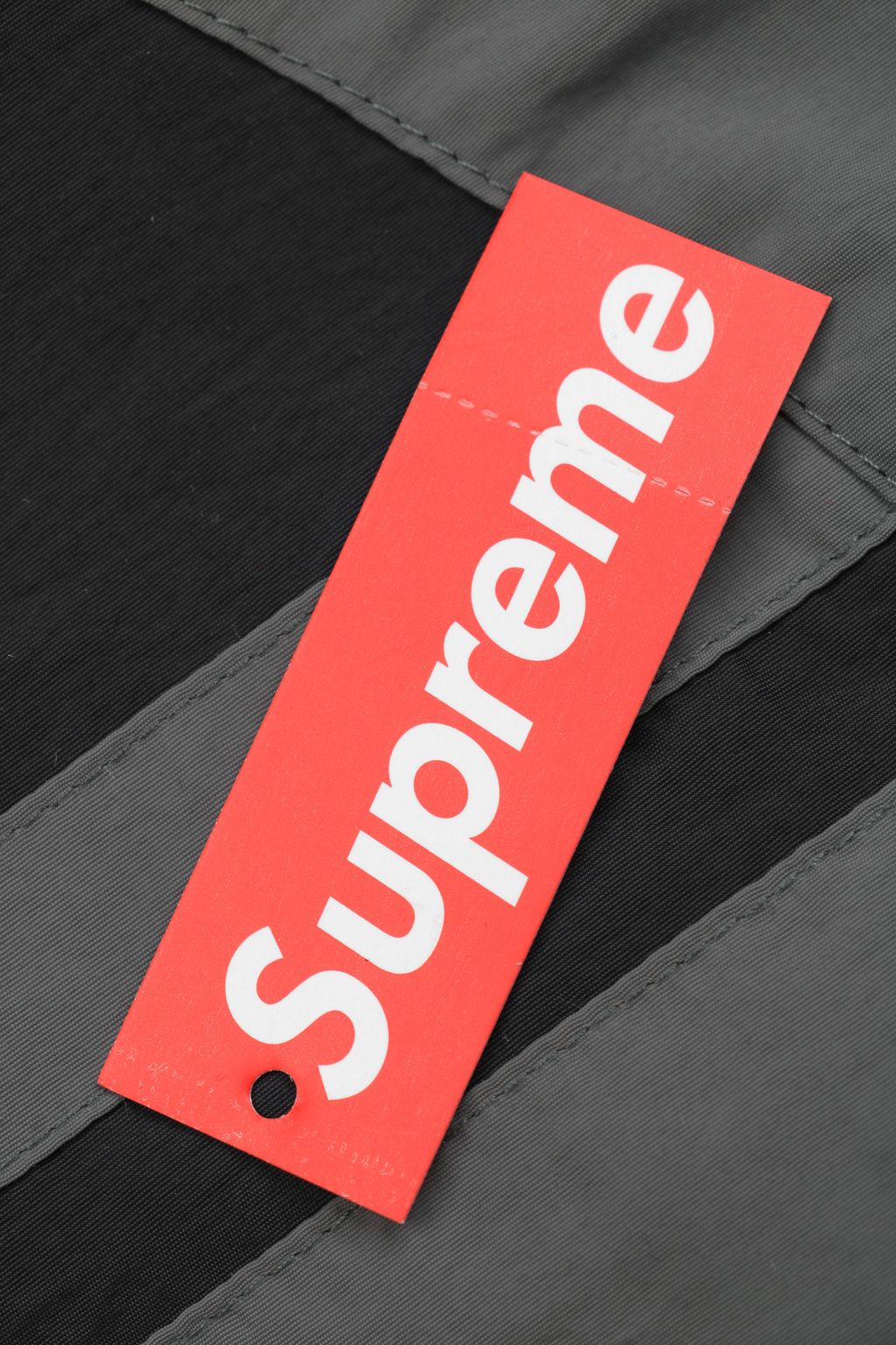 Supreme Ducati racing stand collar track jacket black matte technical fabric breathable mesh lining 3D silicone logo metal plaque YKK zipper unisex sizes S-XL