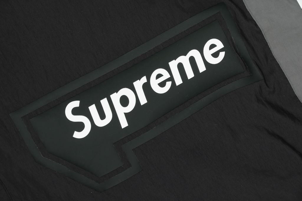 Supreme Ducati racing stand collar track jacket black matte technical fabric breathable mesh lining 3D silicone logo metal plaque YKK zipper unisex sizes S-XL