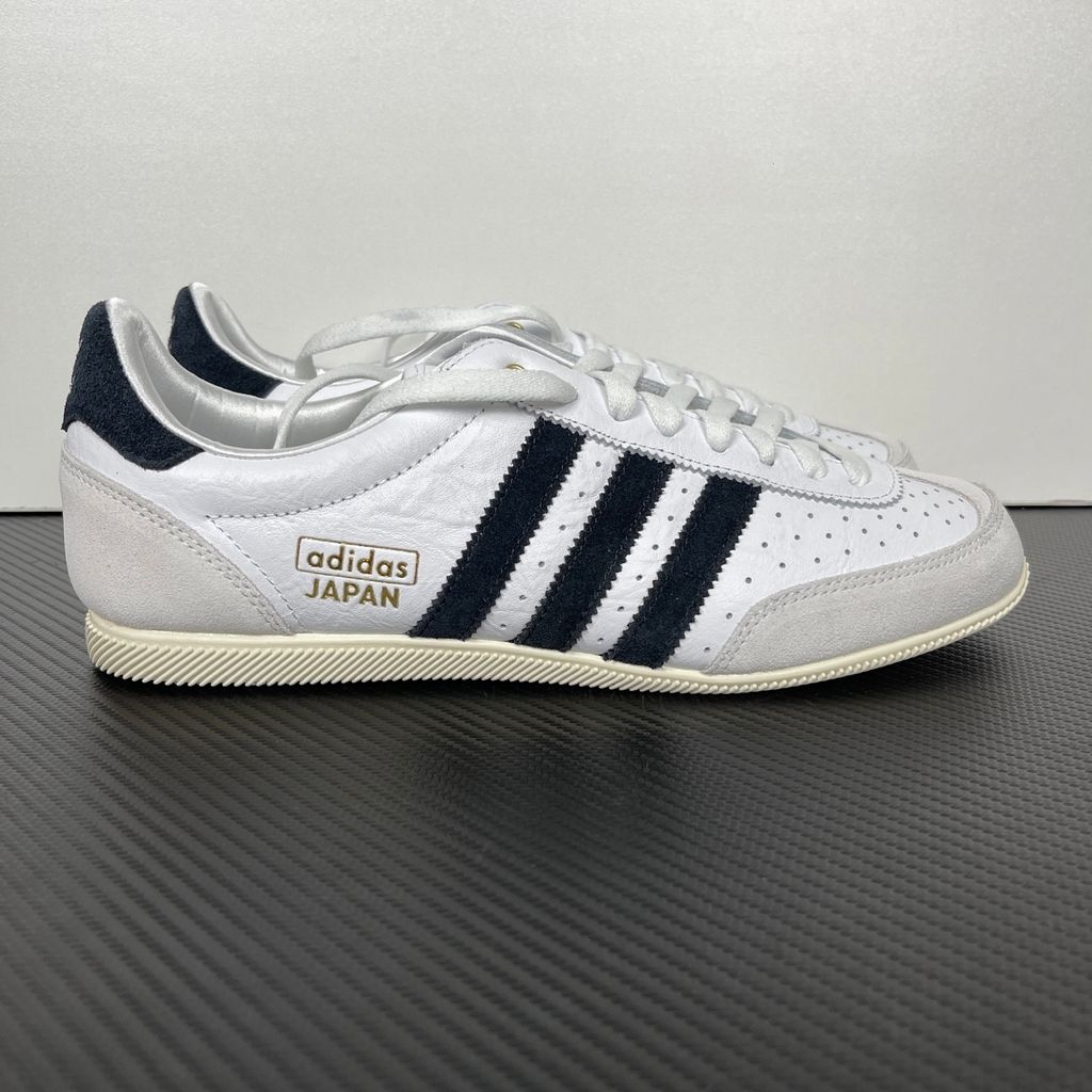 Shop adidas Japan IH5489 in Cloud White, Core Black and Gold Metallic with a leather upper, double-stitched T-toe and archival 1964 low-profile styling.