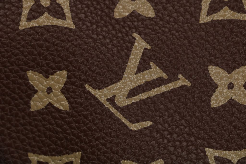 Louis Vuitton Monogram grained leather jacket brown all over Monogram print gold tone motifs yellow piping side pockets sizes 46 48 50 52