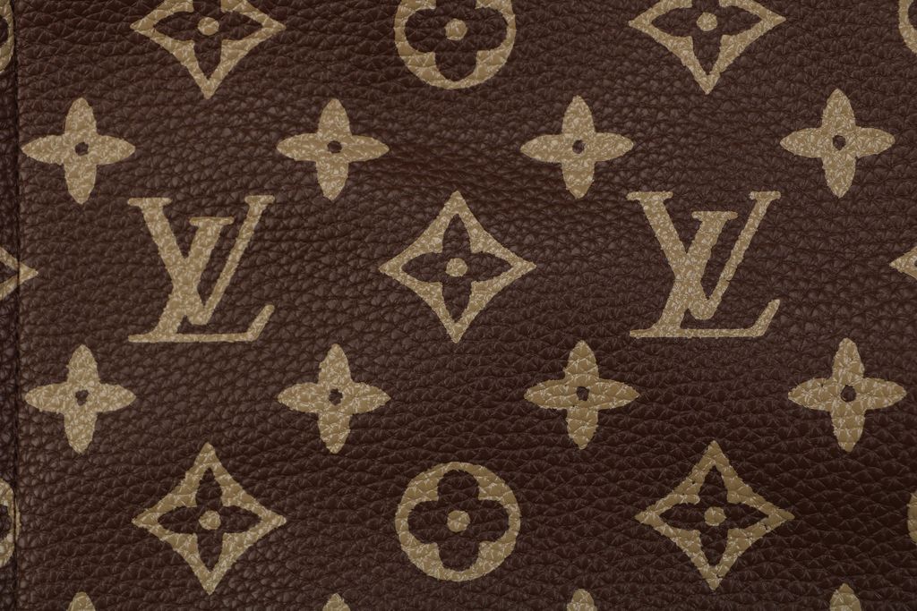 Louis Vuitton Monogram grained leather jacket brown all over Monogram print gold tone motifs yellow piping side pockets sizes 46 48 50 52