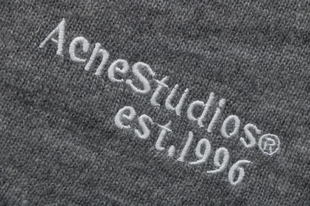 Acne Studios N8-1996 small logo embroidered polo sweater grey yak wool blend 14 gauge STOLL knit raglan sleeves Tajima embroidery horn buttons sizes S-XL
