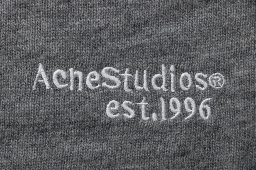 Acne Studios N8-1996 small logo embroidered polo sweater grey yak wool blend 14 gauge STOLL knit raglan sleeves Tajima embroidery horn buttons sizes S-XL