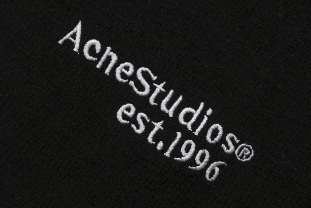 Acne Studios N8-1996 small logo embroidered polo sweater black yak wool blend 14 gauge STOLL knit raglan sleeves Tajima embroidery horn buttons sizes S-XL