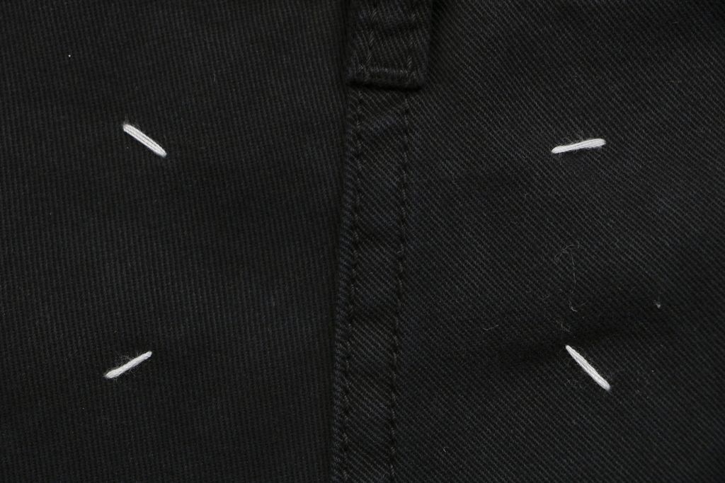 Maison Margiela four stitch trousers hand sewn back detail fully bound interior seams precision side topstitching custom finishing sizes S-XL