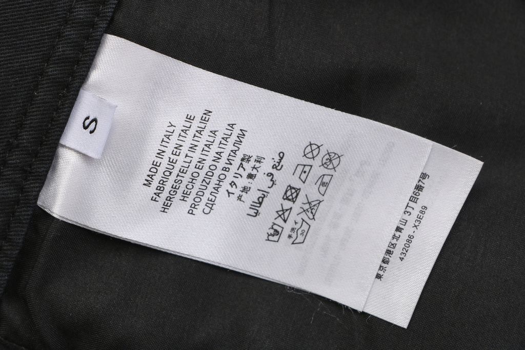 Maison Margiela four stitch trousers hand sewn back detail fully bound interior seams precision side topstitching custom finishing sizes S-XL
