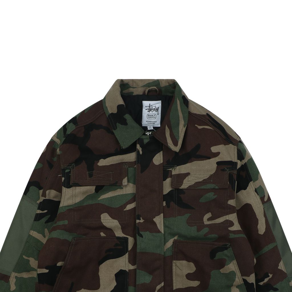 Stussy four pocket tonal jacquard embroidered work jacket structured fabric chest letter logo relaxed drop shoulder unisex utility outerwear sizes S-XL