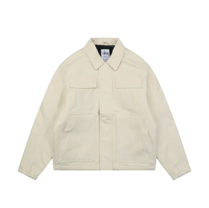 Stussy four pocket tonal jacquard embroidered work jacket beige structured fabric chest letter logo relaxed drop shoulder unisex utility outerwear sizes S-XL
