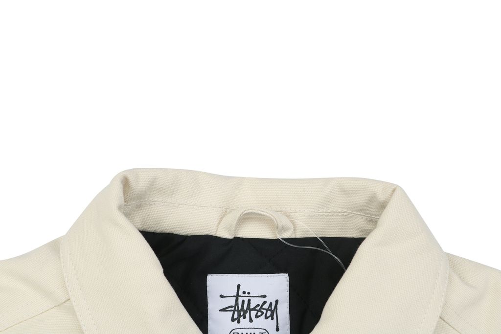 Stussy four pocket tonal jacquard embroidered work jacket beige structured fabric chest letter logo relaxed drop shoulder unisex utility outerwear sizes S-XL