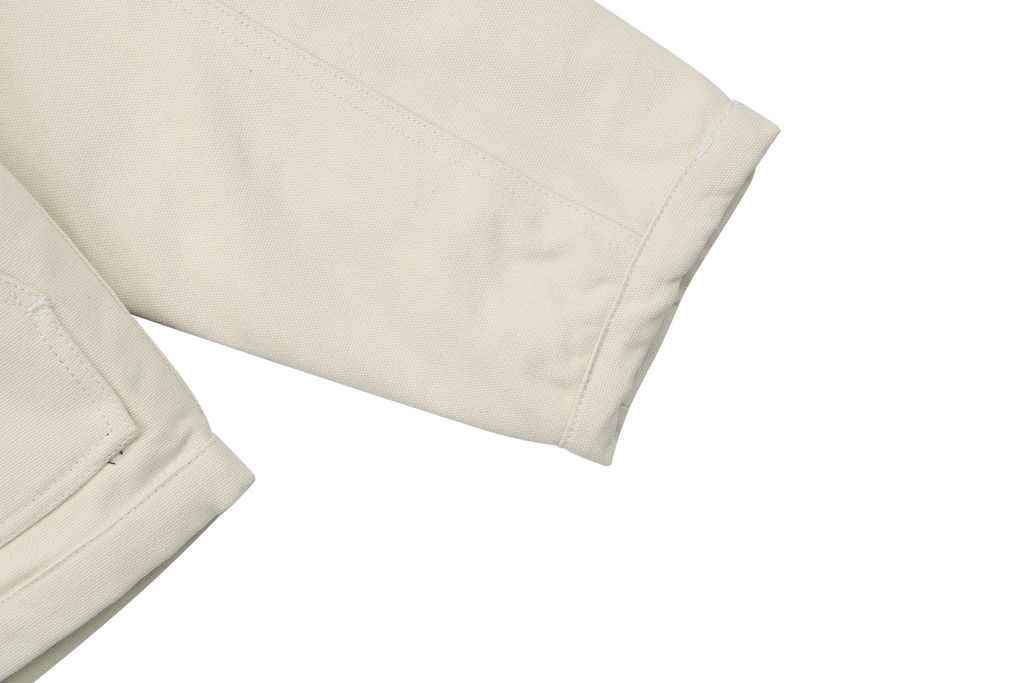 Stussy four pocket tonal jacquard embroidered work jacket beige structured fabric chest letter logo relaxed drop shoulder unisex utility outerwear sizes S-XL
