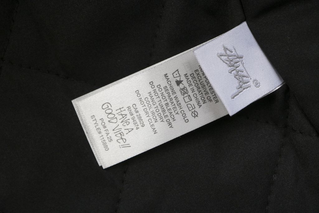 Stussy four pocket tonal jacquard embroidered work jacket black structured fabric chest letter logo relaxed drop shoulder unisex utility outerwear sizes S-XL