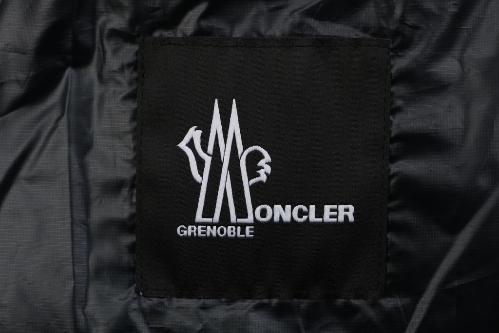 Moncler Anglin black women’s stand collar down ski jacket MX-046 90 white duck down ripstop nylon thumbhole cuffs zip pockets adjustable hem sizes 0 1 2 3