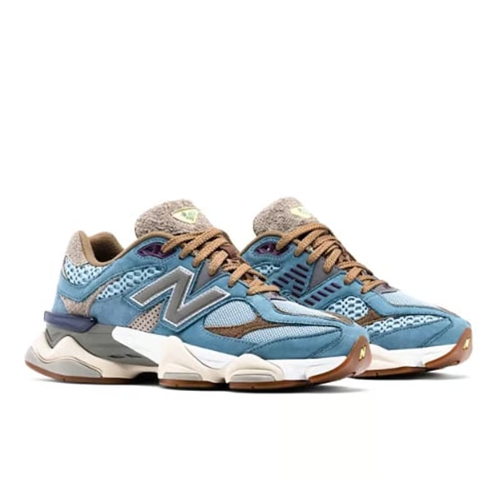 New Balance 9060 blue sneakers angled view pair