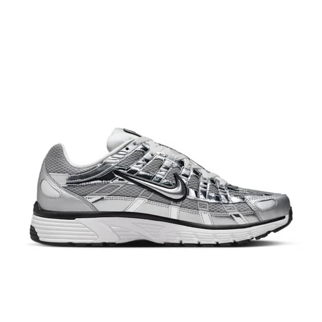 Close up of Nike Swoosh on P-6000 Metallic Silver illustrating Y2K layered construction and foam midsole