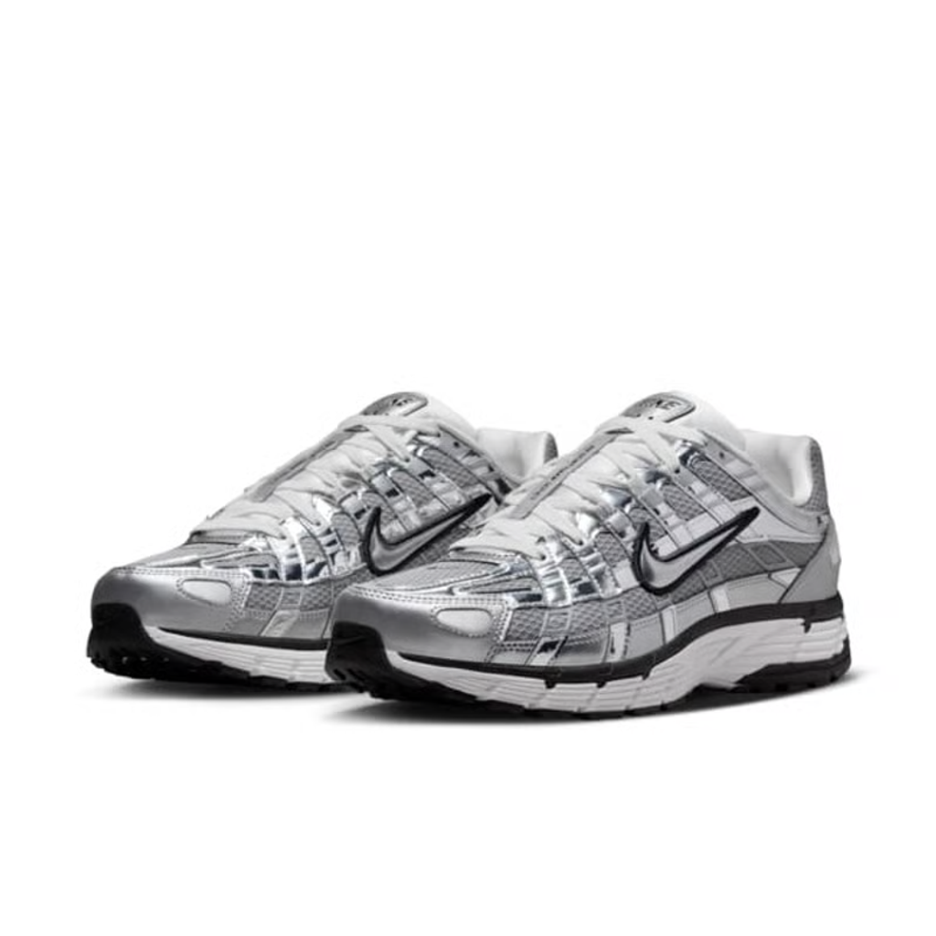 Back heel view of Nike P-6000 with P-6000 branding and silver retro aesthetic design